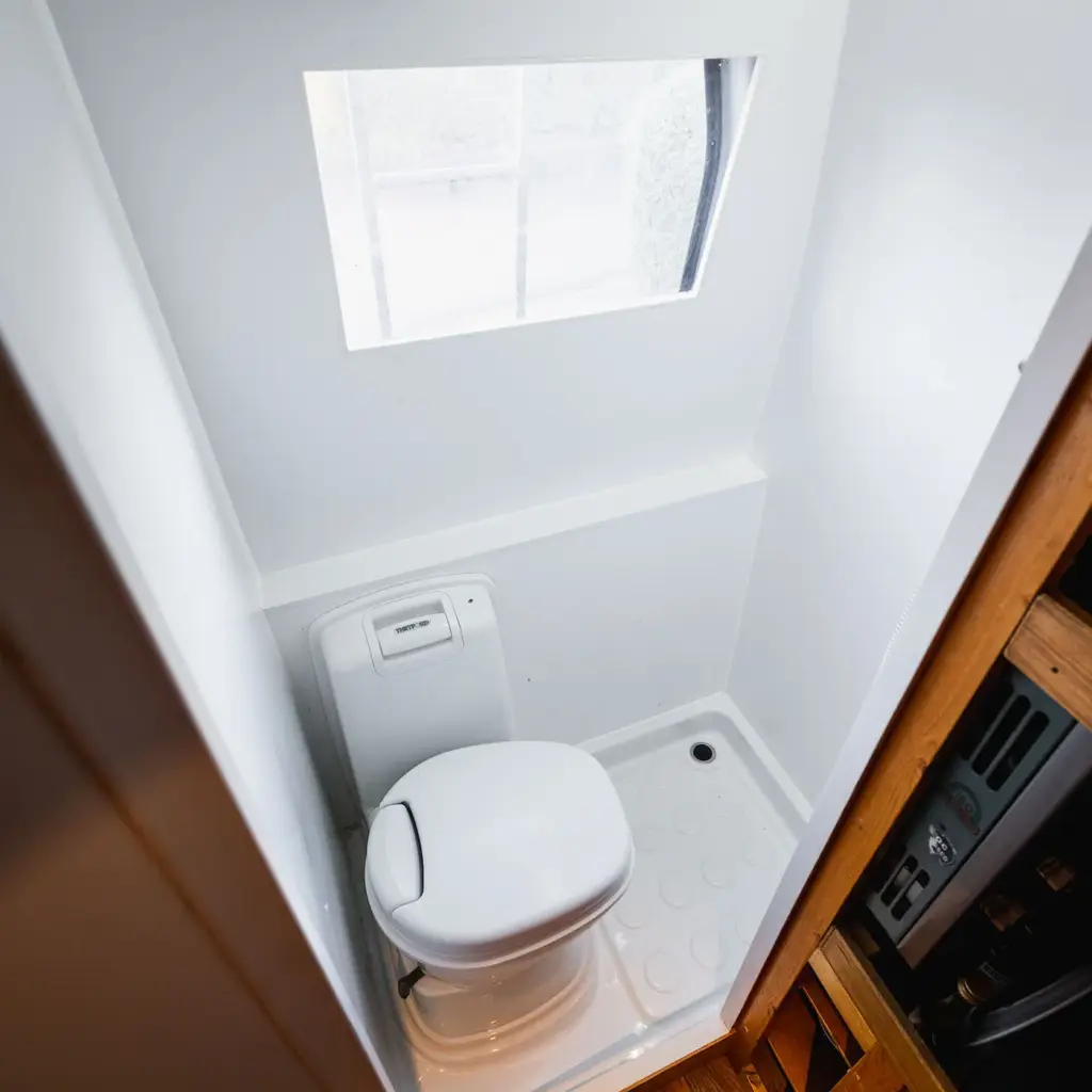 Placeholder photo of the van's kitchen storage and sink.